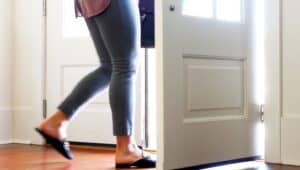 image of walking out the door that portrays the spiritual truth of leaving the strongman's house for christian deliverance